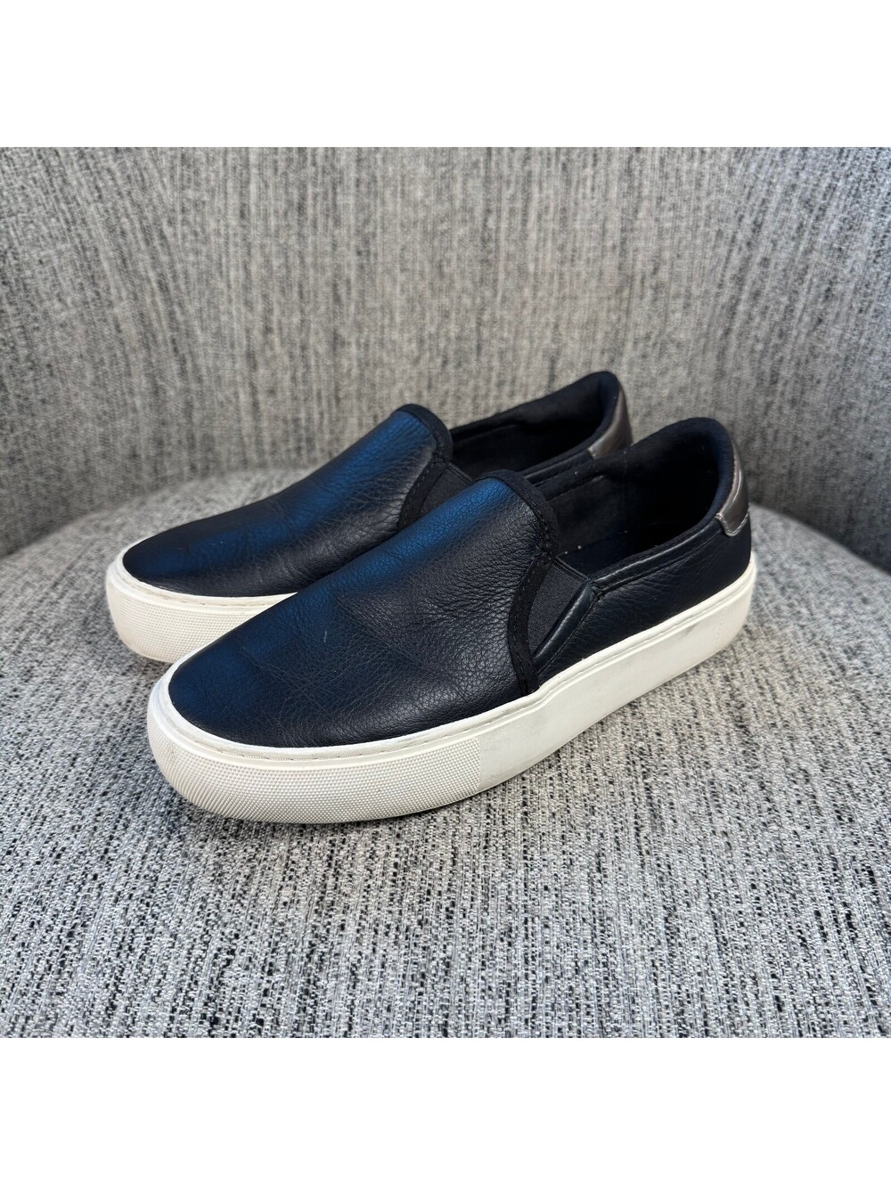 UGG Cahlvan Womens 7 Black Leather Slip-On Sneakers with Metallic Heel Detail